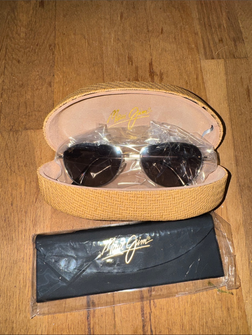 Maui Jim Aviator Sunglasses with Black Lenses and Gold Frame